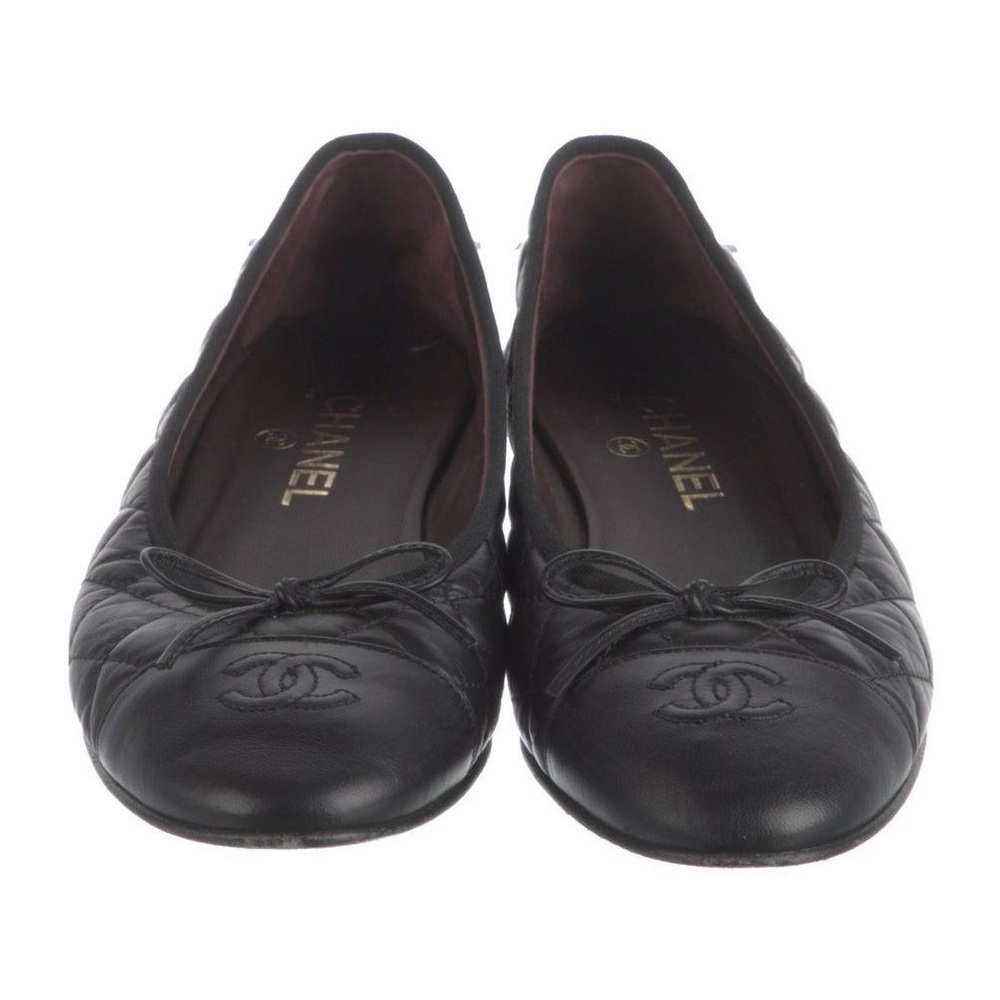 CHANEL Quilted Black Leather Flats